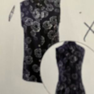 Cabi button down blouse with peplum.